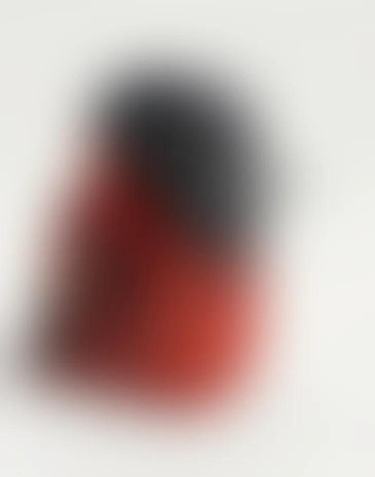 Blurred prototype of the Red Siskin